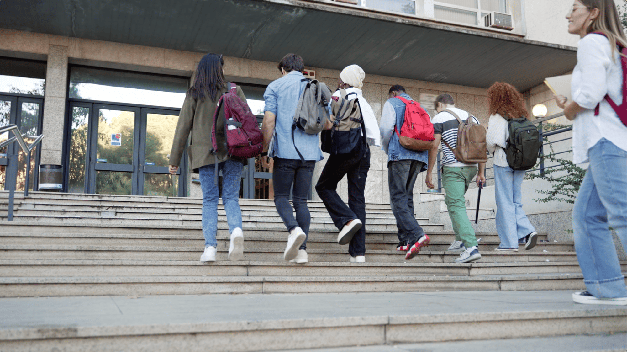 students walking into school